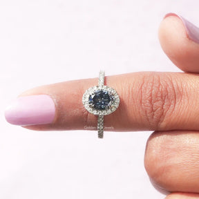 In finger front View of Sapphire Blue Oval Cut Engagement Ring