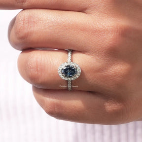 Detailed View Of Sapphire Blue Oval Cut Engagement Ring In White Gold