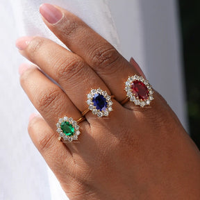 View of Oval Gemstone Halo Engagement Ring In finger