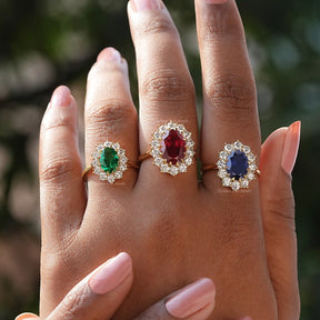 Oval And Round Cut Engagement Ring In finger