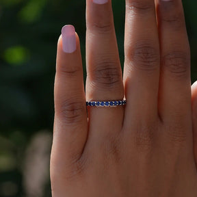 Close view of Sapphire Blue Round Eternity Band