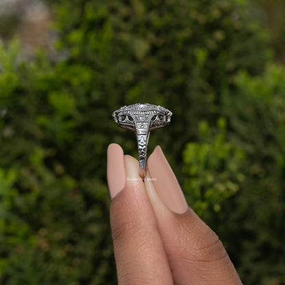 Sterling silver round moissanite ring underside view with prongs and engraved band