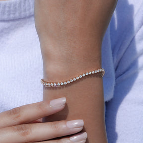 View of Round Cut Diamond Tennis Bracelet In Yellow Gold