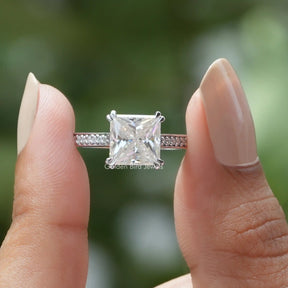 [In two finger front view of princess cut moissanite engagement ring made of white gold]-[Golden Bird  Jewels]