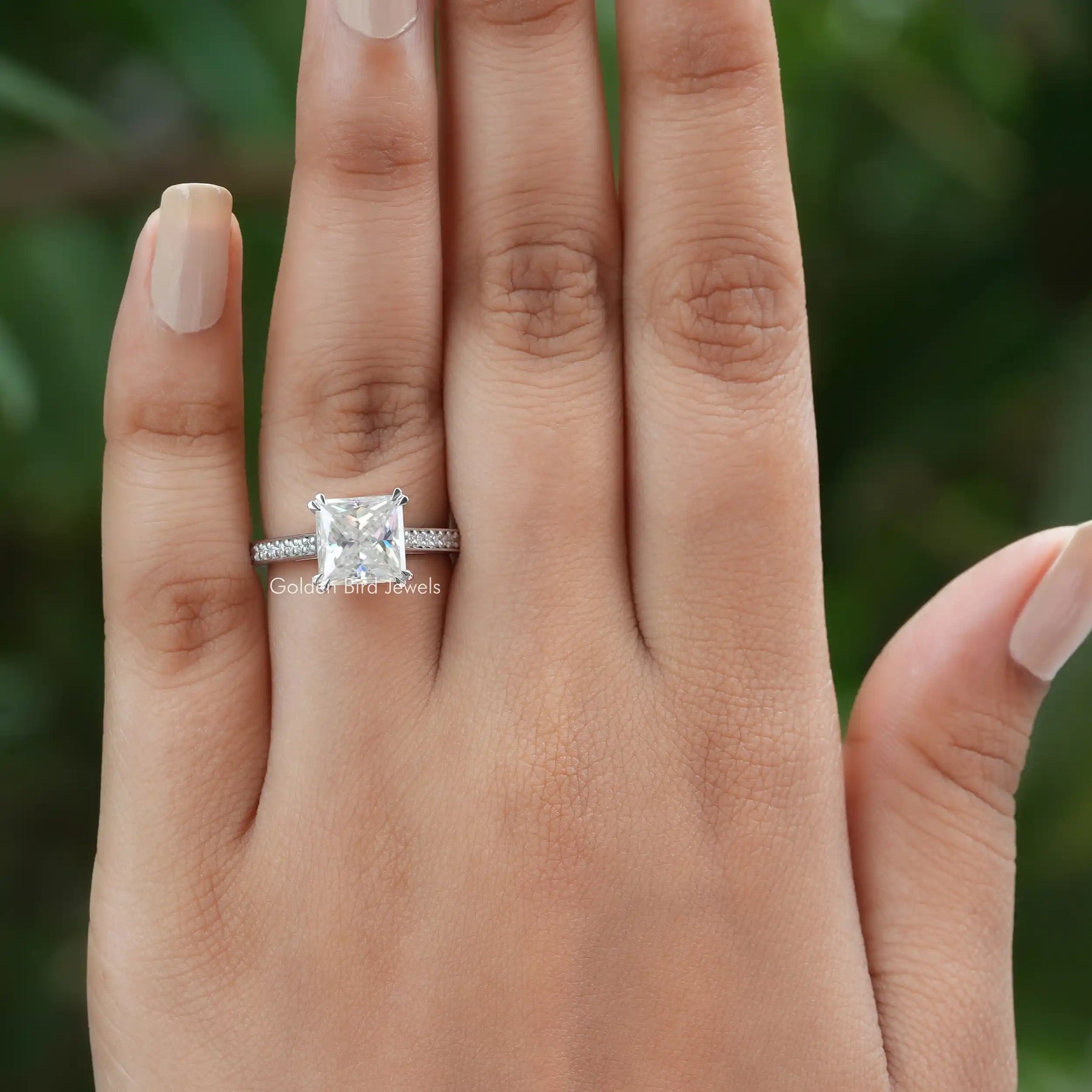[In finger front view of princess cut moissanite engagement ring made of 18k white gold]-[Golden Bird  Jewels]