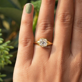 [In finger front view of solitaire cushion cut moissanite ring crafted with prong setting]-[Golden Bird Jewels]