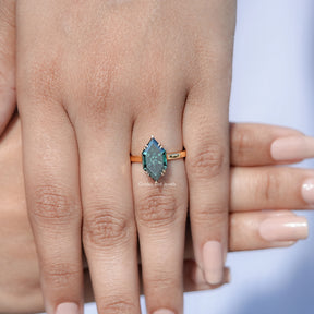 In front finger View Of Dutch Marquise Moissanite Solitaire Ring