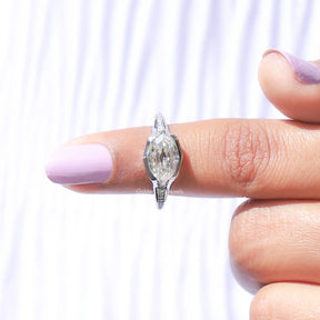 In finger front View of Step Cut Marquise Moissanite Bridal Ring