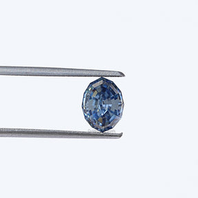 Twijer hold in the Step Cut Oval Moissanite Loose Stone In blue 
