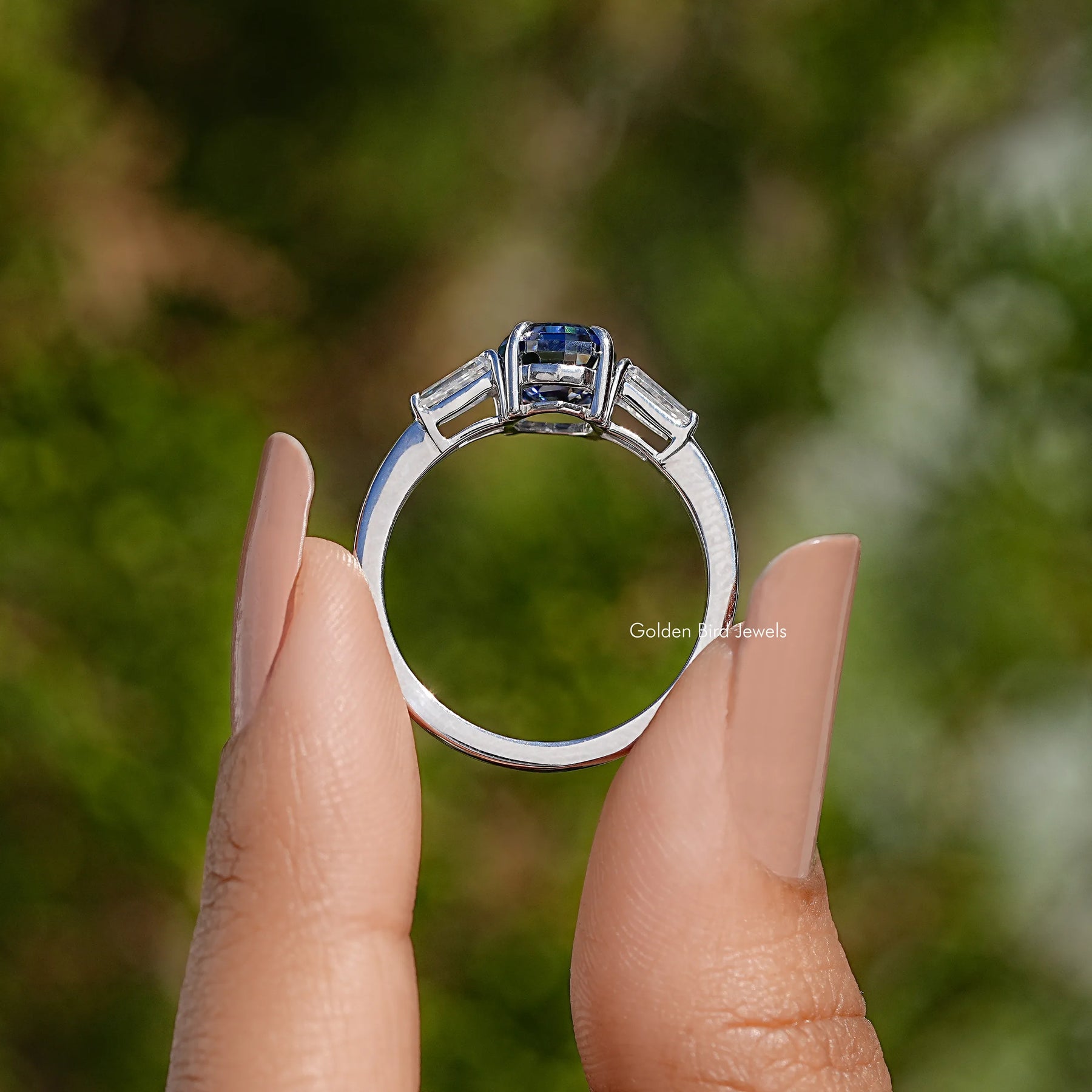 Step Cut Riing Blue Step Cut Oval Three Stone Ring