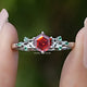 Front view of Sunstone Hexagon Cut Gemstone Accent Ring Set in two fingers 