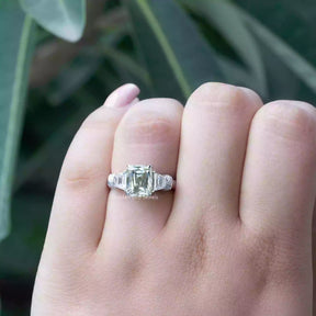 [Trapezoid and round cut three stone engagement ring made of white gold]-[Golden Bird Jewels]