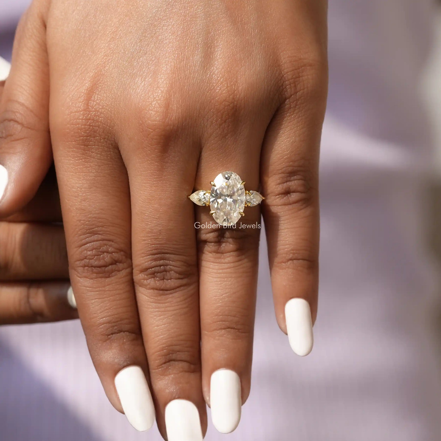 Oval Cut Three Stone Moissanite Ring