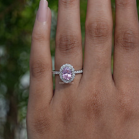 Detailed View Of Oval Cut Gemstone Halo Accent Ring