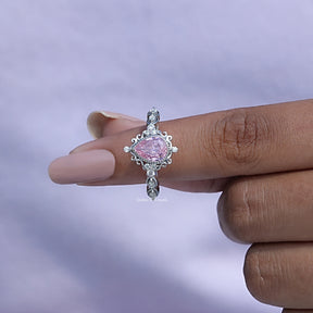 In finger front View of Pear And Marquise Cut Engagement Ring In White Gold