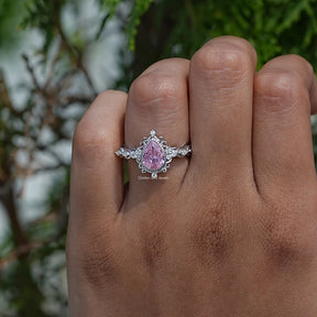 Detailed View Of Pear Cut Gemstone Accent Stone Ring