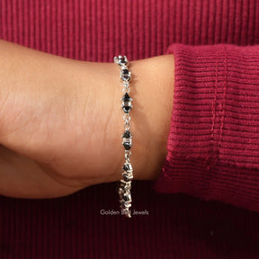 Side view of trillion  Cut Bracelet In white  Gold