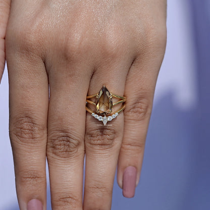 Rose cut pear moissanite bridal ring set on a hand