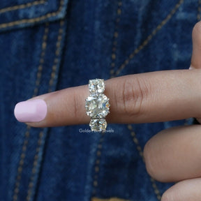 [In finger front view of cushion cut moissanite ring]-[Golden Bird Jewels]