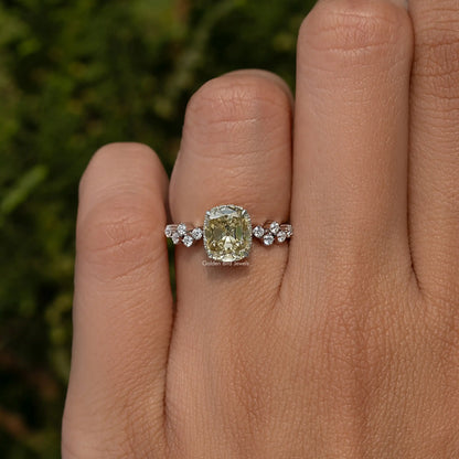 Sterling silver moissanite engagement ring with cushion center stone and round side stones