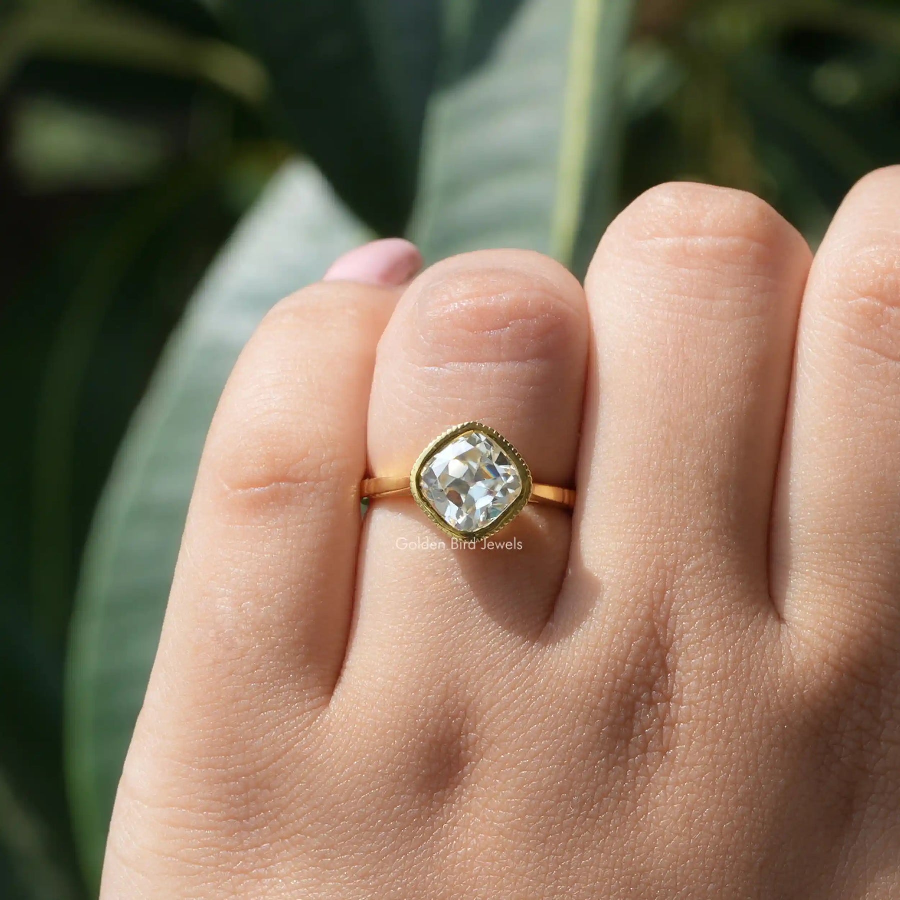 [This old mine cushion cut solitaire engagement ring in 14k yellow gold]-[Golden Bird Jewels]