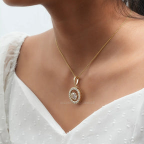 In neck front view of yellow gold round cut moissanite pendant