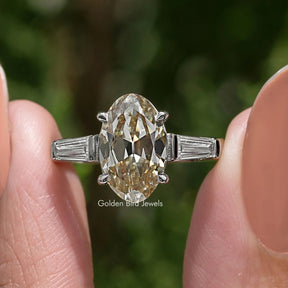 Yellow Old Mine Oval Moissanite Three Stone Ring