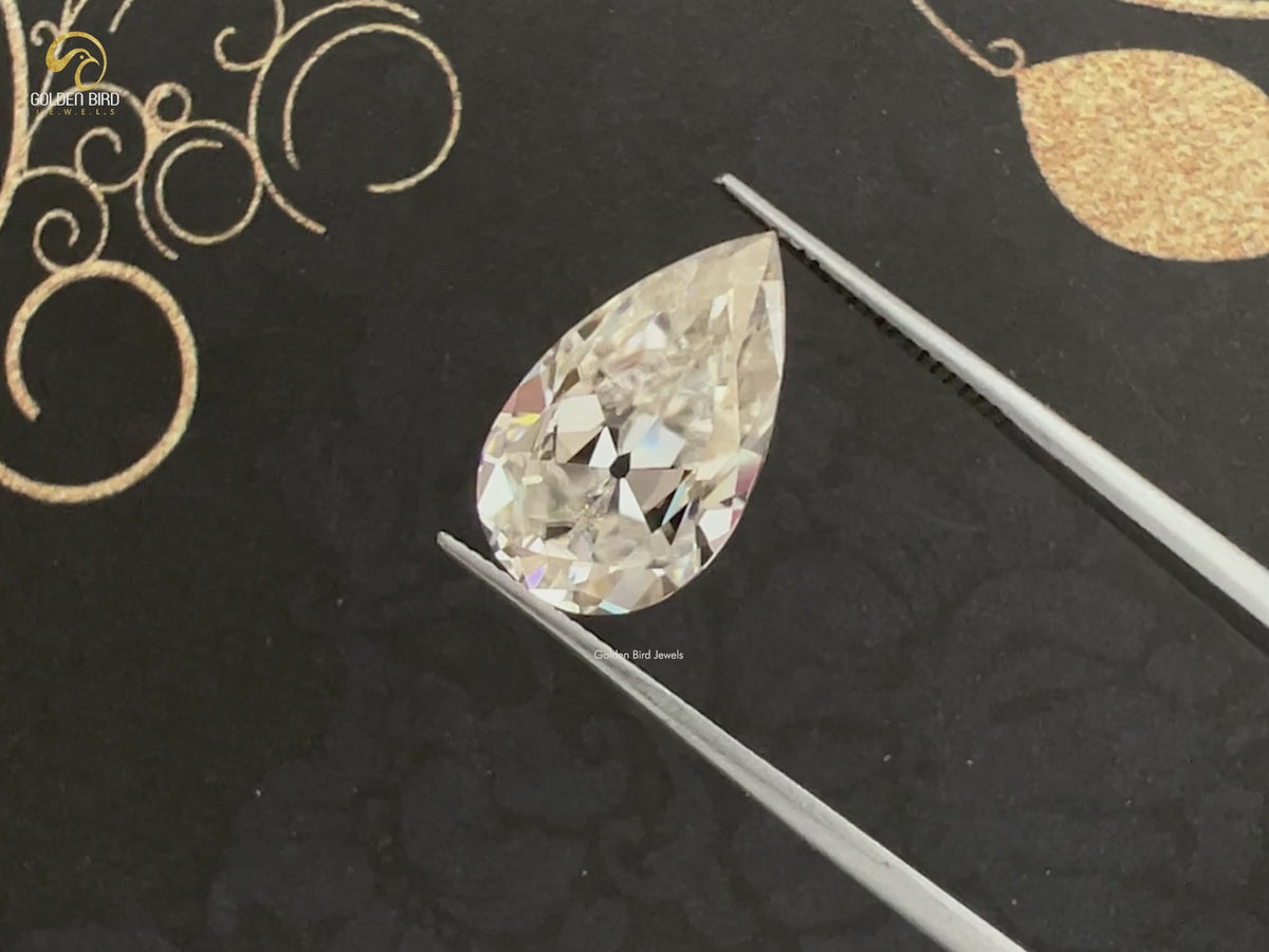 Off White Old Mine Pear Loose Moissanite