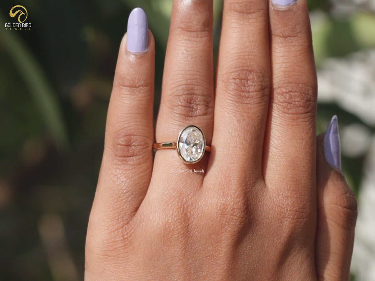 Oval Cut Moissanite Solitaire Bezel Set Ring
