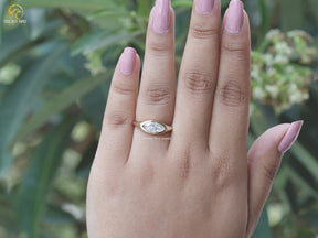 East West Marquise Cut Bezel Set Moissanite Ring