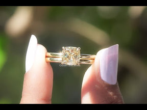 Youtube vide of yellow cushion cut solitaire moissanite ring 