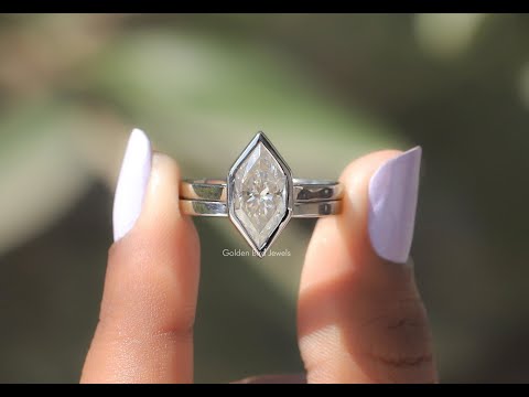 Youtube video of moissanite ring in colorless marquise diamond 
