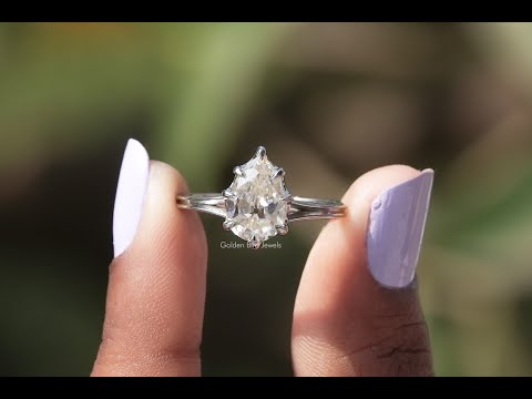 Youtube video of halo stone engagement ring with old mind shape pear diamond 