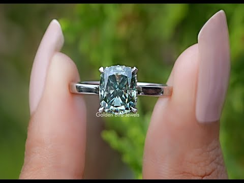 video view of Fancy Green Elongated cushion moissanite hidden halo ring
