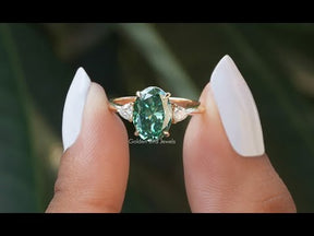 YouTube Video Of Oval And Triangle Cut Moissanite Three Stone Ring