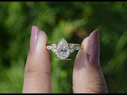 You tube Video Of Pear cut moissanite Accent engagement ring
