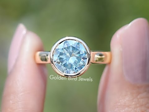 Light Blue Round Cut Moissanite Solitaire Ring