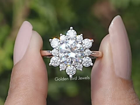 Round Cut Moissanite Halo Engagement Ring in two fingers 
