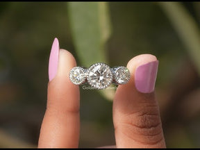 YouTube Video Of Round Cut Bezel Set Moissanite Three Stone Ring