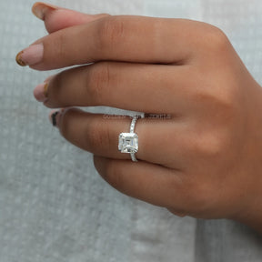 hand view of colorless asscher cut moissanite solitaire engagement ring made with white gold