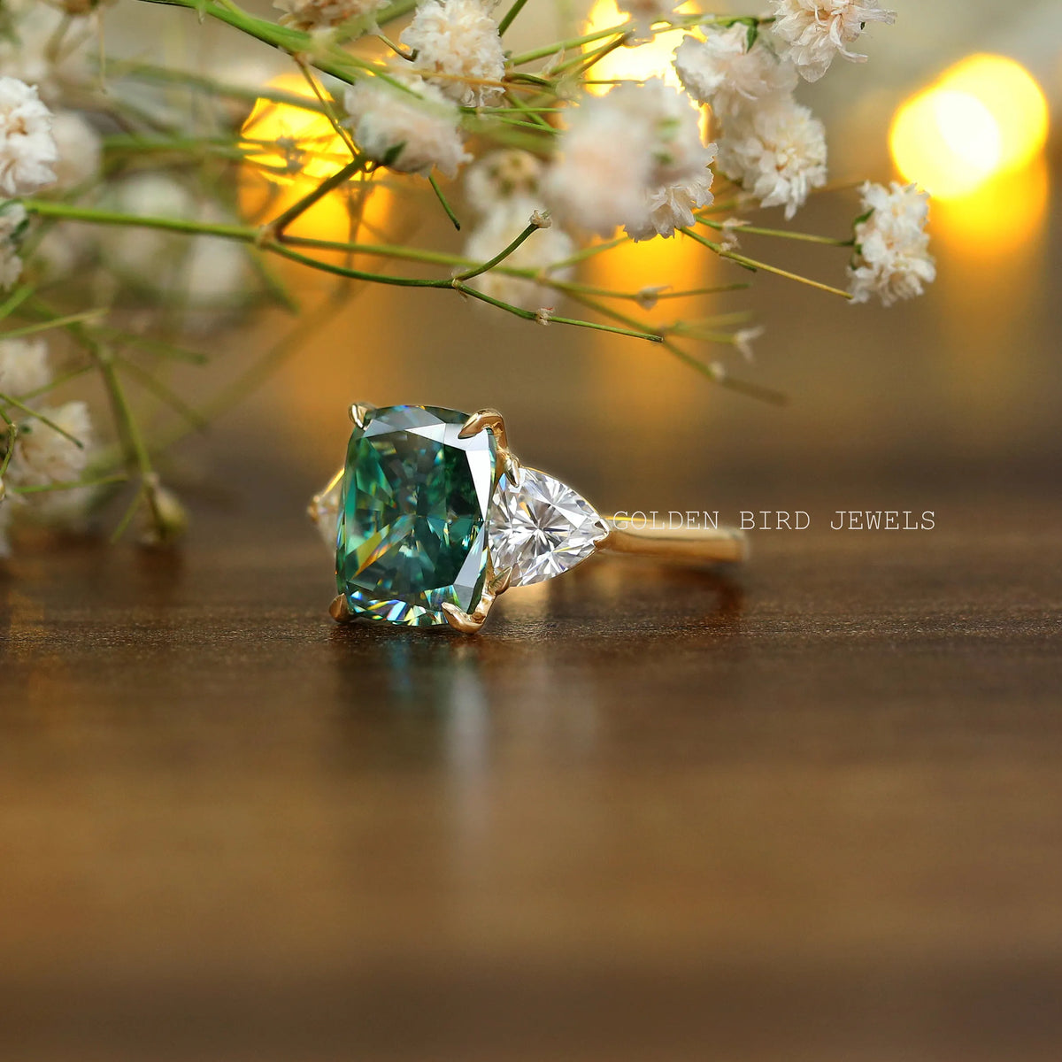 Close view of A moissanite engagement  ring featuring a cushion shape stone 