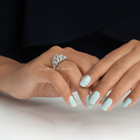 [In finger side view of old european round cut moissanite bridal art deco ring]