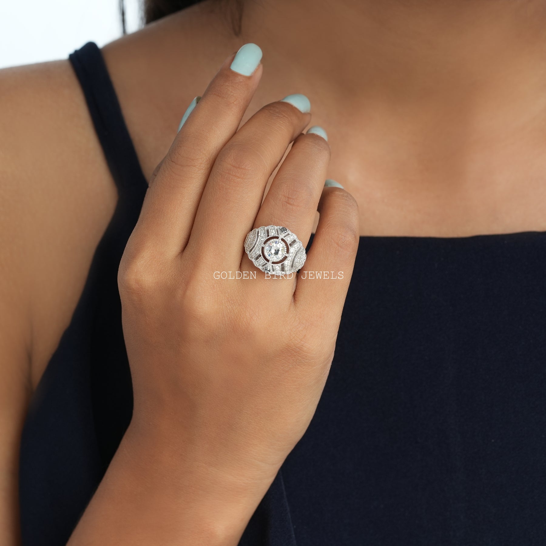 [Vintage style bridal ring set crafted with round cut moissanite]