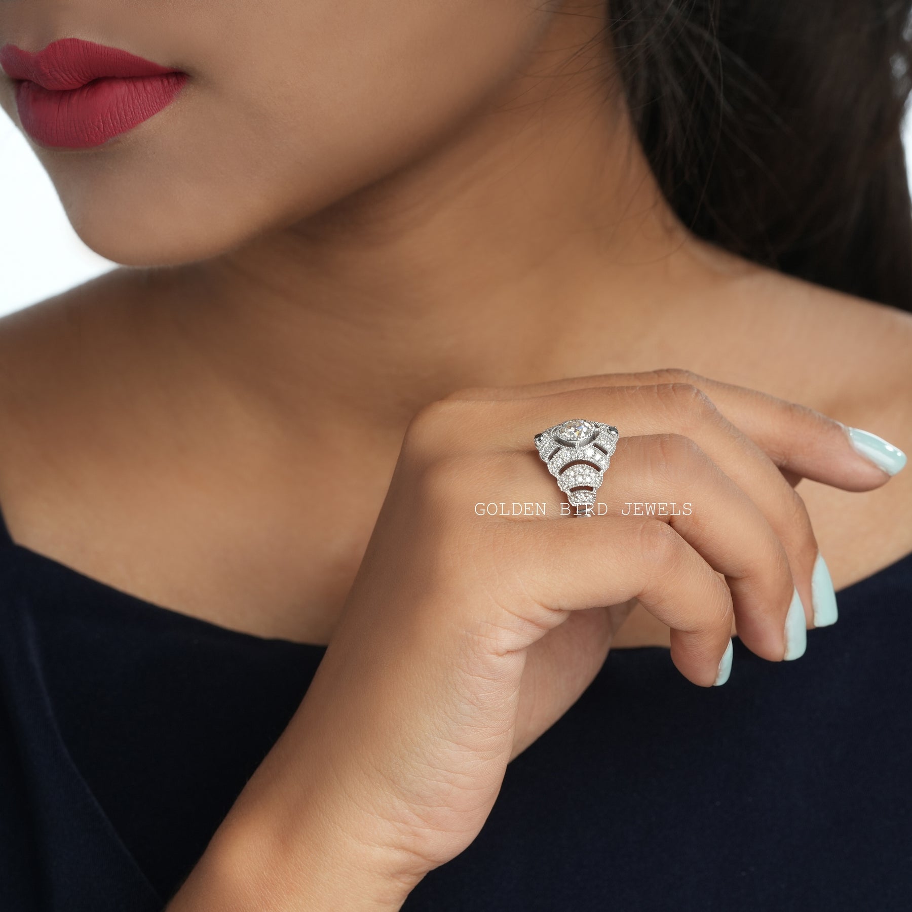 [Slightly folded finger side view of ols european round cut moissanite ring made in 158k white gold]