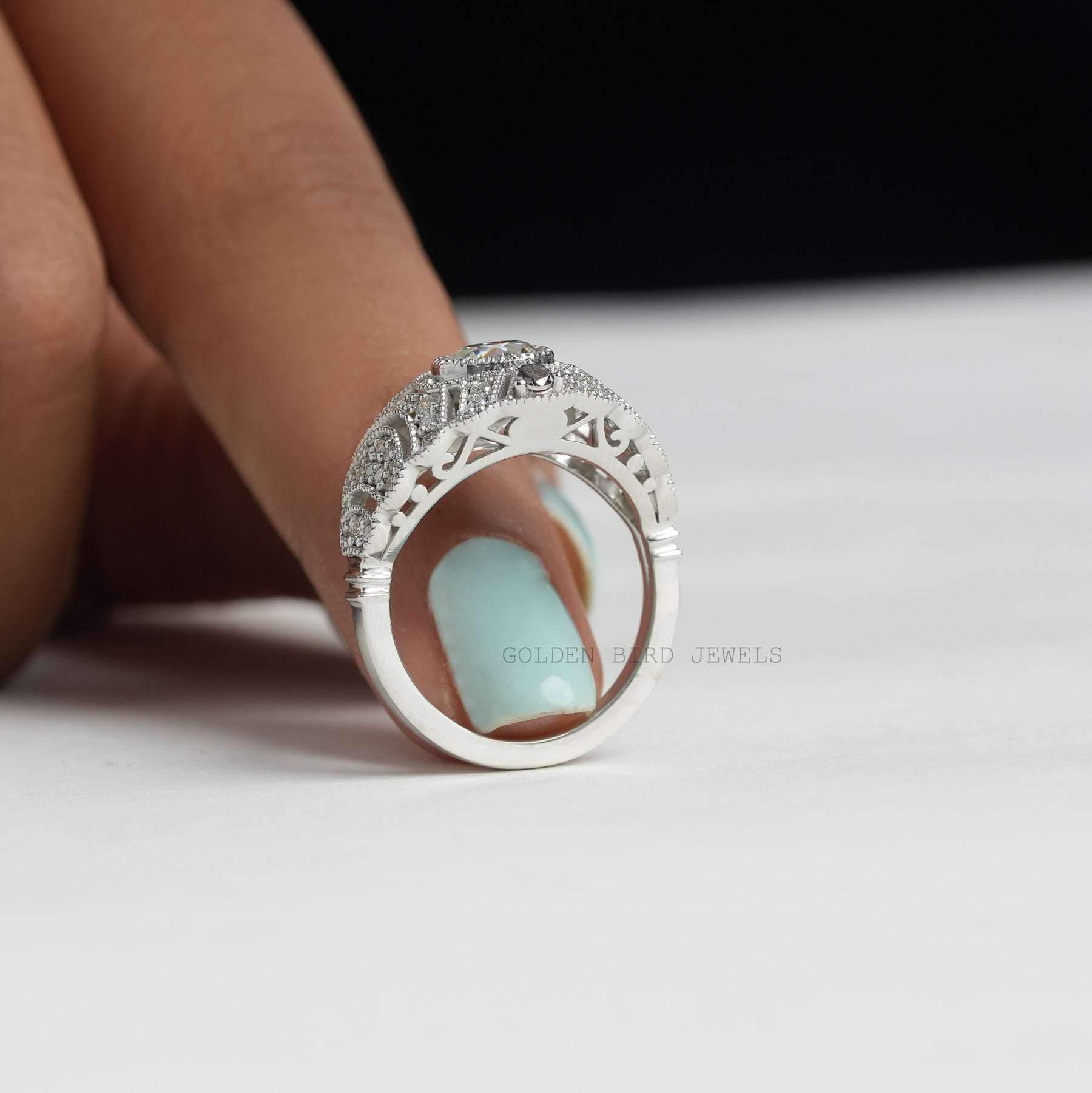 [This art deco ring crafted with round cut moissanite stone]
