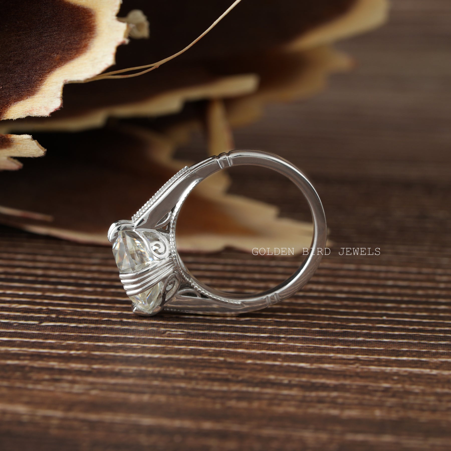 [A white gold ring with a colorless round cut stone in the middle]-[Golden Bird Jewels]
