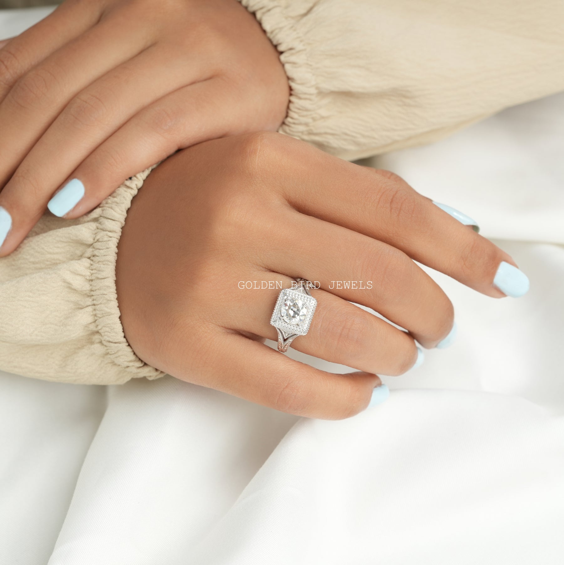 [Moissanite round cut ring set in prong setting at golden bird jewels]