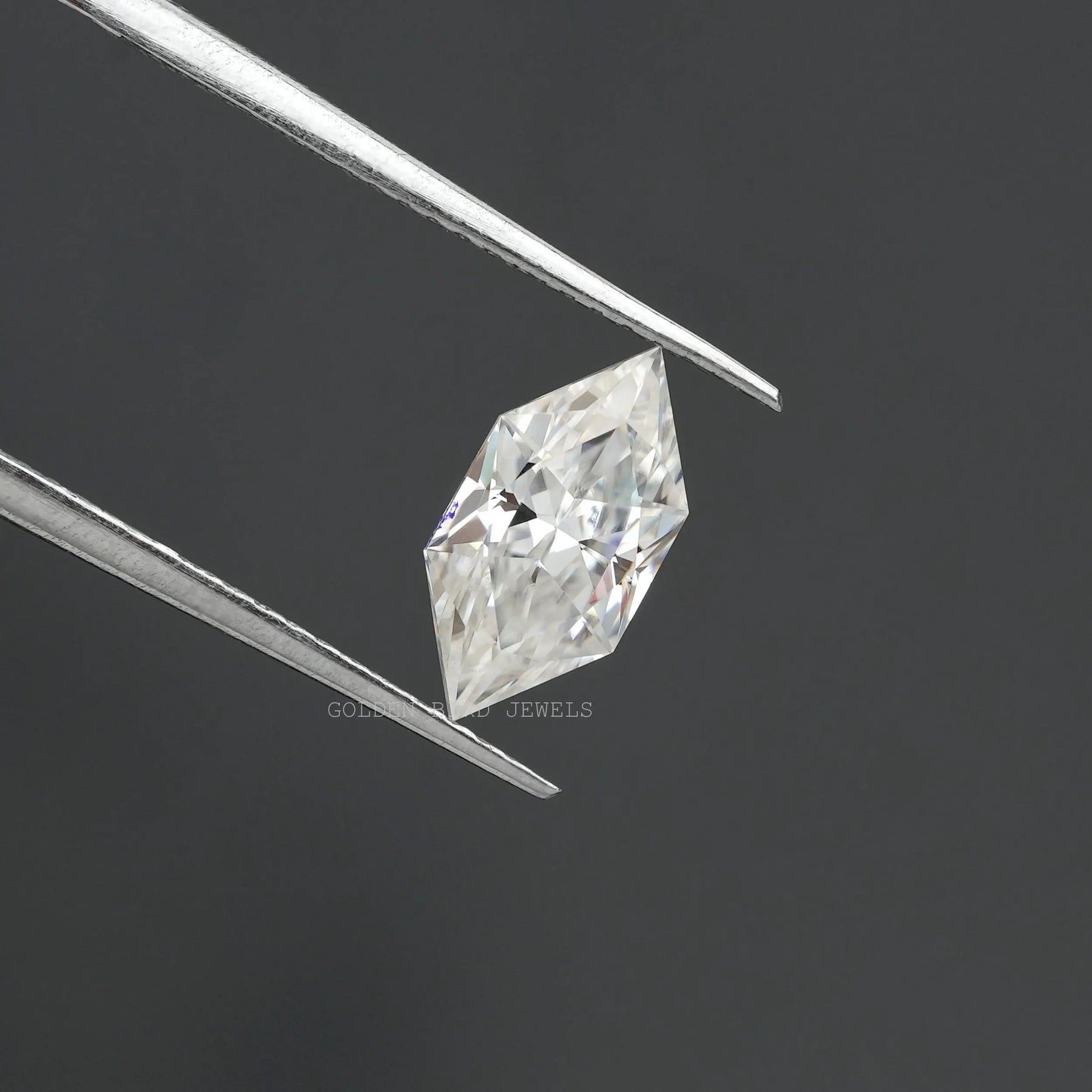 In tweezer look of Excellent Cut Dutch Marquise Cut Moissanite Stone
