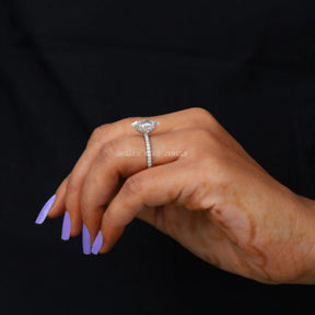 In Finger Side View Of Dutch Marquise Cut Solitaire Ring With Side Stone