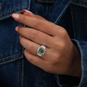 In Finger View Of Cushion Cut Three Stone Moissanite Engagement Ring